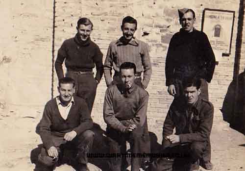 POW Camp (possibly Sulmona Italy) 1st ;eft Tommy Miller, middle Pete ?, 3rd left George Yoxhall- Front rown middle Jack Smith 3rd left Bill Dean